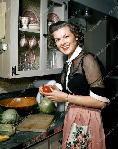 Barbara Hale preparing a salad in the kitchen portrait 8b20-3295