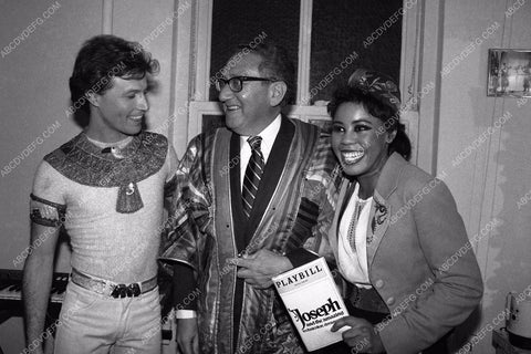 candid Andy Gibb in dressing with others 8b20-3786