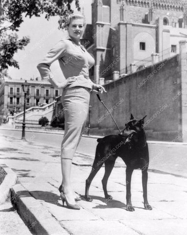 candid Anita Ekberg takes her doberman pinscher dog for a walk 8b20-3961