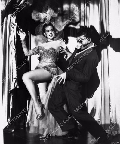 Ann Miller with folks ready for masquerade party dp-4101