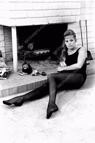 dancer Barrie Chase in her leotards lies in front of the fireplace 8b20-4626