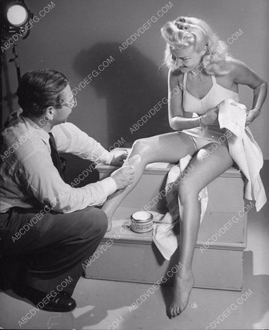 lucky gets to put cold cream on Betty Grable's legs 8b20-4817