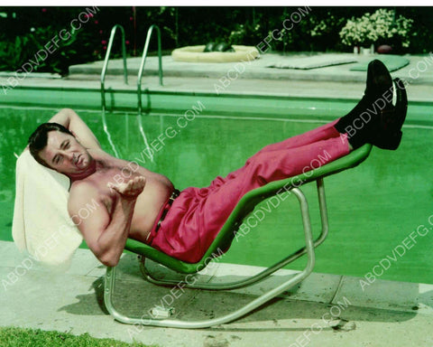Robert Mitchum laying out by the pool 8b20-5022