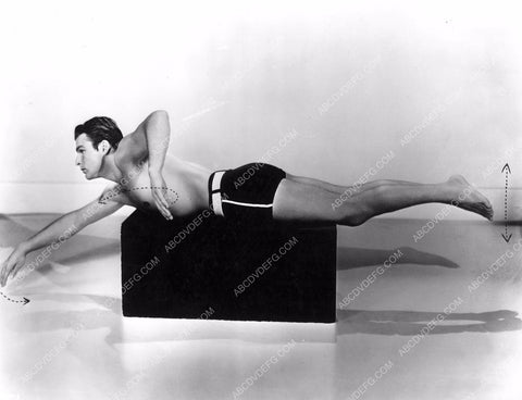Olympic athlete Buster Crabbe demonstrates proper swimming moves 8b20-5616