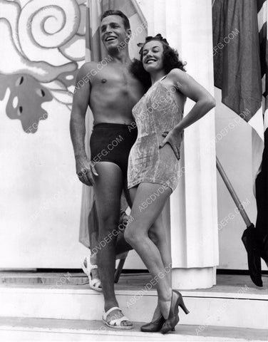 Buster Crabbe and friend show off their new swimwear 8b20-5620