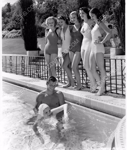 bunch of babes get swimming instructions from Buster Crabbe 8b20-5639