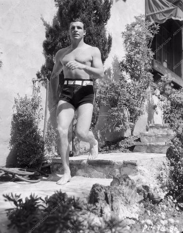 beefcake Buster Crabbe heading for the pool 8b20-5645