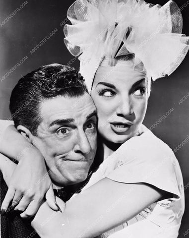 Edward Everett Horton squeazed by Carmen Miranda 8b20-5676