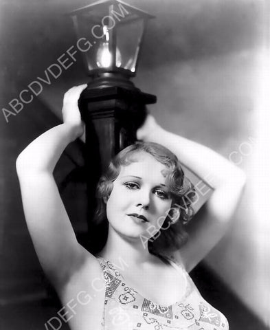 Anita Page leaning against a lamp post 8b20-5696