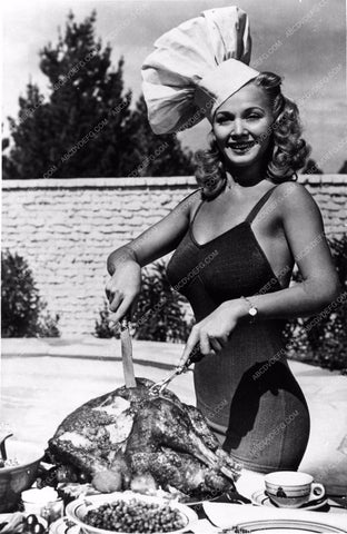 sexy Carole Landis carving a turkey in the backyard 8b20-5960