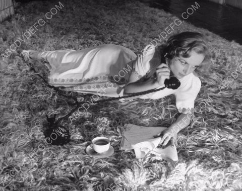Carole Lombard on the telephone with a cup of coffee 8b20-6107