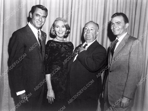Cary Grant Eva Marie Saint Alfred Hitchcock and someone 8b20-6165