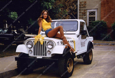 sexy Catherine Bach sitting on her custom jeep 8b20-6312