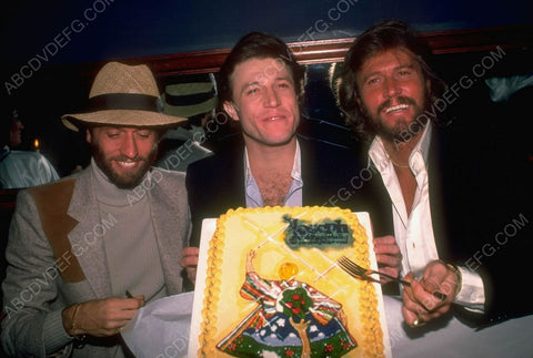 Andy Gibb and cool cake presented by two of his brothers 8b20-6553