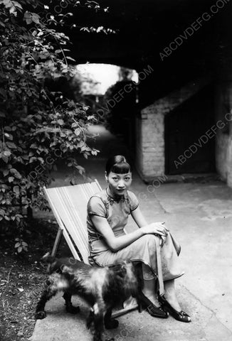 Anna May Wong outdoors with her dog 8b20-6612
