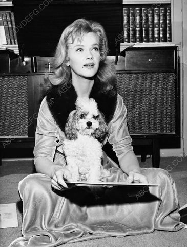 Anne Francis and her dog pick a record to listen to 8b20-6679