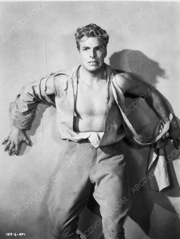 Buster Crabbe has his back against the wall 8b20-7000