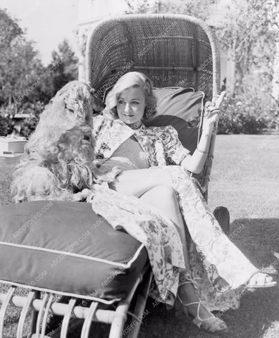 Constance Bennett and her dog in the backyard 8b20-7414