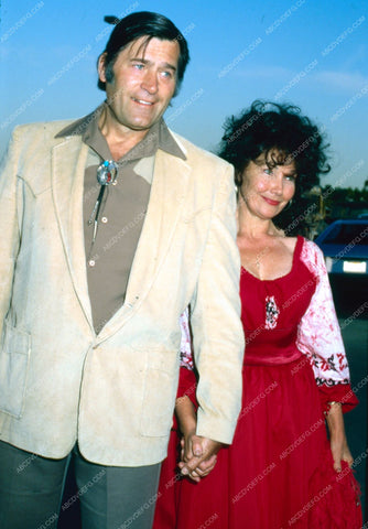 Clint Walker and wife maybe at public event 8b20-7446