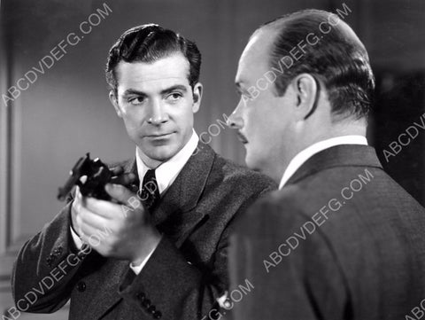 Dana Andrews inspects firearm film noir Beyond a Reasonable Doubt 8b20-7678