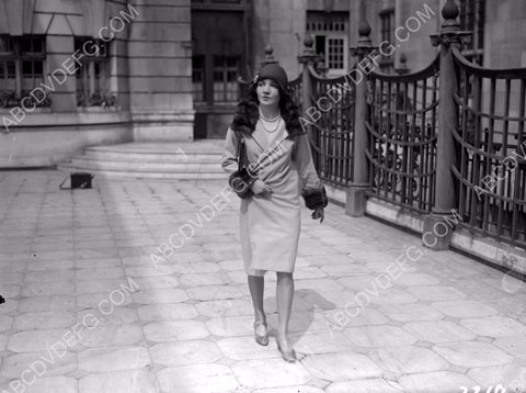 Claudette Colbert strolling on the sidewalk 8b20-7698