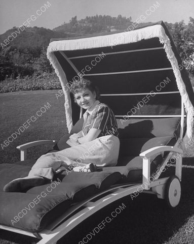 Claudette Colbert laying out in the sun 8b20-7717