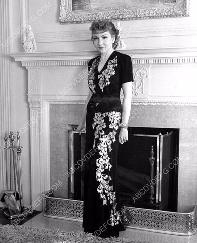 Claudette Colbert by the fireplace 8b20-7743