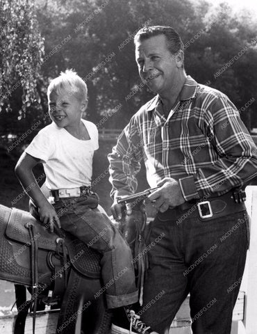 Dick Powell playing with his son 8b20-8224