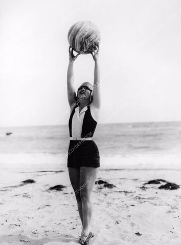 Clara Bow playing with a beachball 8b20-8369