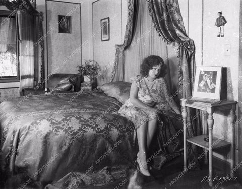 Clara Bow sitting on bed at home 8b20-8379