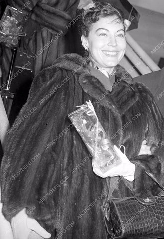 candid Ava Gardner getting off an airplane 8b20-8480