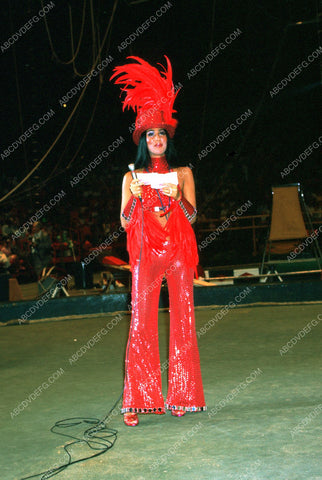Cher performs ringleader duties for the circus 8b20-9102