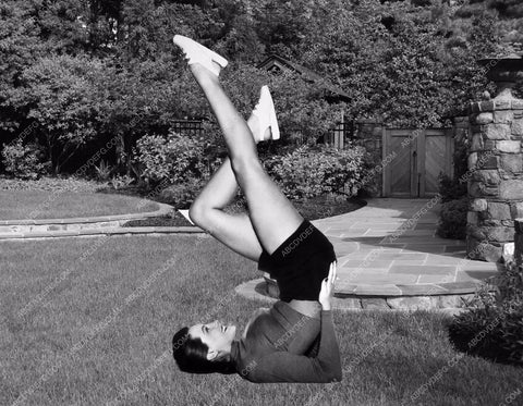 Cyd Charise does her daily leg exercises 8b20-9447