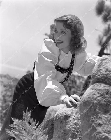 Loretta Young posing on rocks lyoung-28
