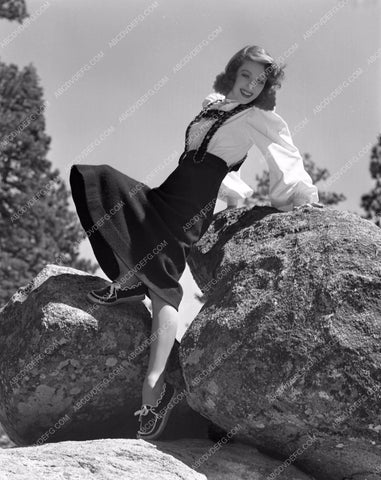 Loretta Young posing on rocks lyoung-29