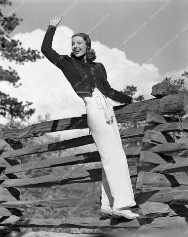 Loretta Young on fence lyoung-31