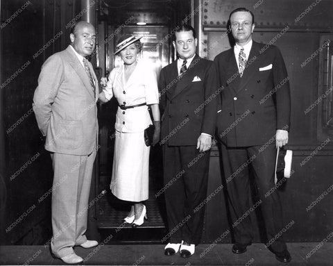 Mary Pickford boarding a train with business folks mpick-38