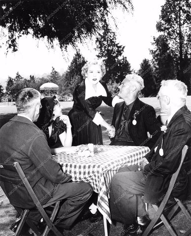 Mary Pickford and guests in backyard at Pickfair mpick-40