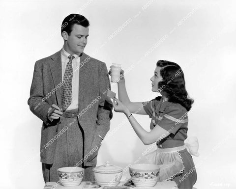 crp-10614 1942 Ann Rutherford offers Robert Sterling a glass of milk film This Time for Keeps crp-10614