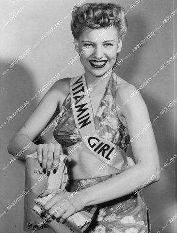 crp-10874 1942 news photo cute physical fit Vitamin Girl Arlene Hennings rips phonebook in half Miss RX crp-10874