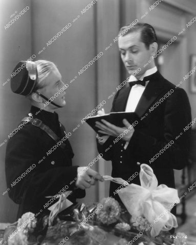 crp-11177 1931 Robert Montgomery signs for the bellhop film The Man in Possession crp-11177