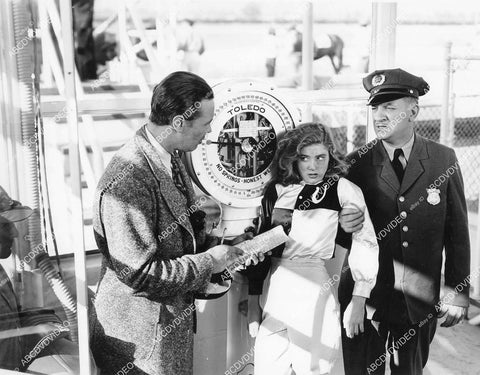 crp-11731 1938 Dick Curtis catches jockey Edith Fellows at weigh in scales film The Little Adventuress crp-11731