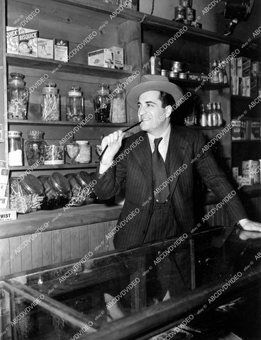 crp-12065 1940's 4x5 photo author William Saroyan gets some candy from general store crp-12065