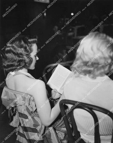 crp-01222 1937 chorus girl takes break does some reading MGM Studios film Broadway Melody of 1938 crp-01222