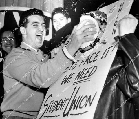 crp-12268 1951 news photo NYU Student Union pie in the face fund raiser Stewart Jackson & Milton Berkwitz crp-12268