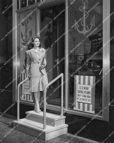 crp-12291 1942 Shirley Patterson at the I Magnin store front Victory Window WWII US War Bonds & Stamps crp-12291