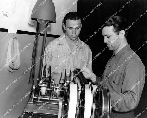 crp-12320 1942 candid Frankie Albert w Columbia Studios sound cutter Weldon Hancock at sync machine film The Spirit of Stanford crp-12320