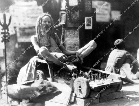 crp-12465 1926 news photo historic India holy man lays on bed of nails crp-12465