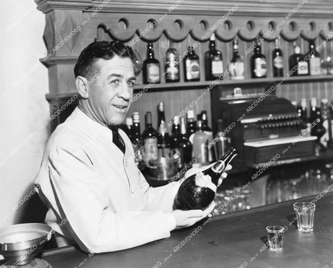 crp-12482 1942 Bud Geary bartender showing off some hooch film Two Yanks in Trinidad crp-12482