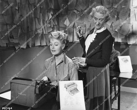 crp-12603 1956 Arlene Dahl gets typewriter lessons Grace Denbeigh-Russell film Wicked as They Come crp-12603